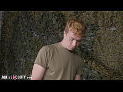 Activeduty redhead sergeant drills recruit